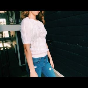 Short sleeved knit sweater.